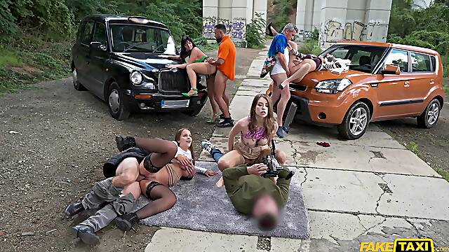 Alluring women fucked in outdoor orgy then soaked in sperm by all these guys