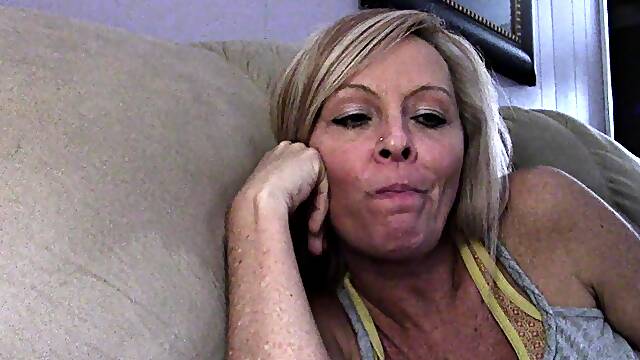 Sexy blonde milf goes solo with a red dildo