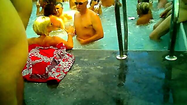 Voyeur finds stunning mature babes enjoying a nudist party