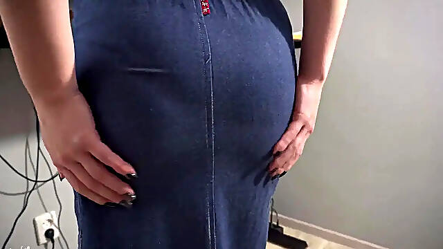 Teasing office secretary shows off MILF ass and panty line