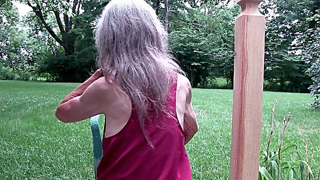 Lilly, the porch, her back, her long granny hair